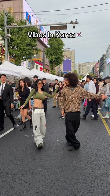 Cover of @noelgoescrazy's come back and back duo TikTok on a street, 4 Oct 2026
